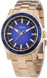 Guess Women's W0469L2 Quartz Watch with Blue Dial Analogue Display Quartz and Rose Gold Stainless Steel Coated Strap